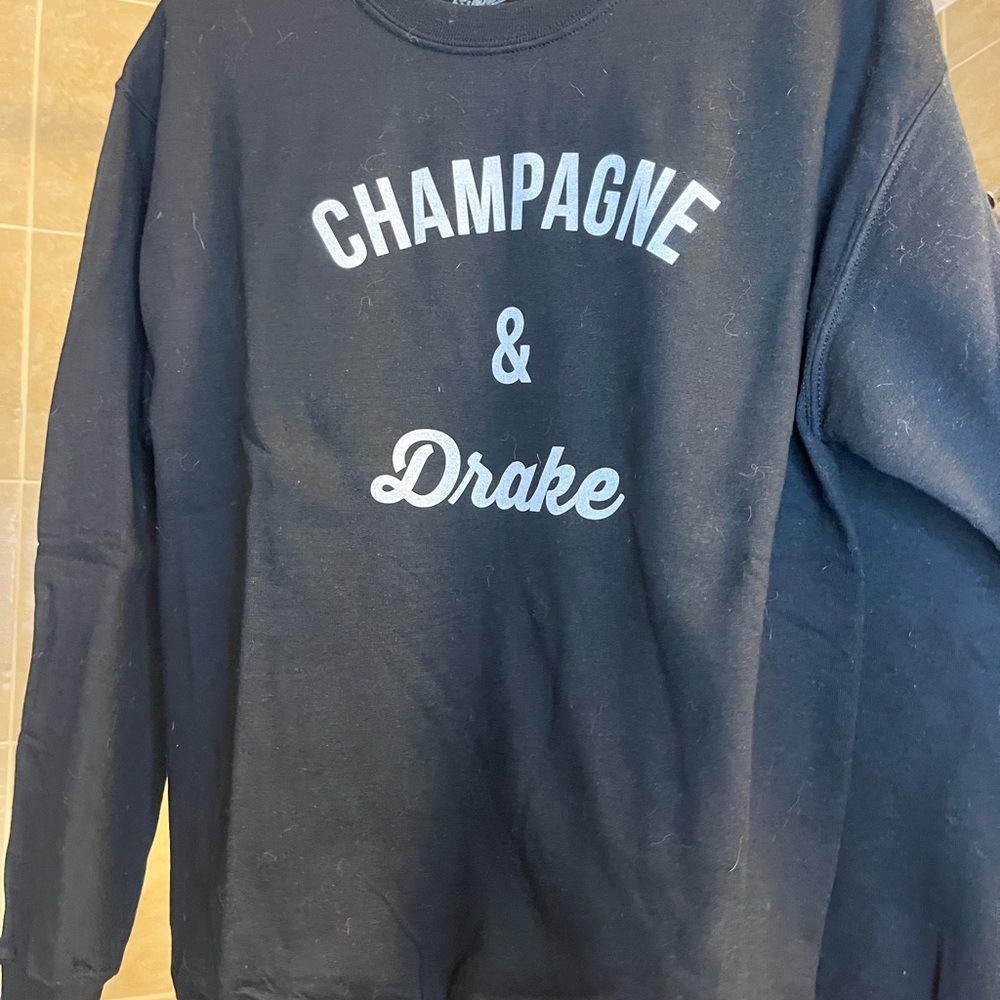 Customer ‘champagne and Drake’ Sweater